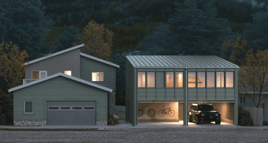 Modern two-story house with a garage, bicycles, and a parked car at dusk.